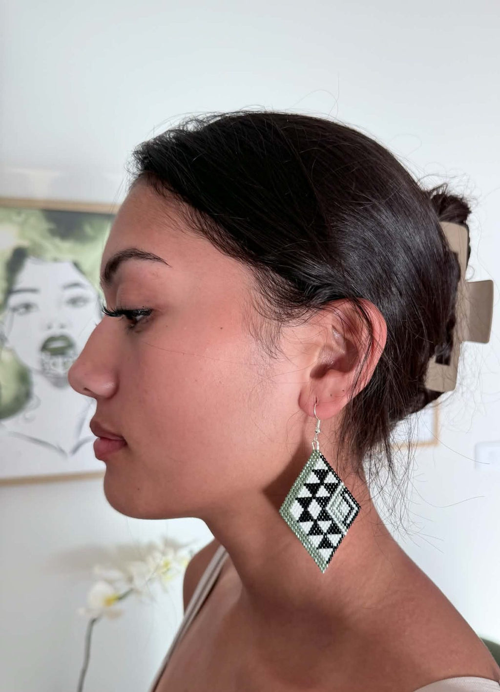 Hori.Inc Piko beaded earrings worn, side view showing size