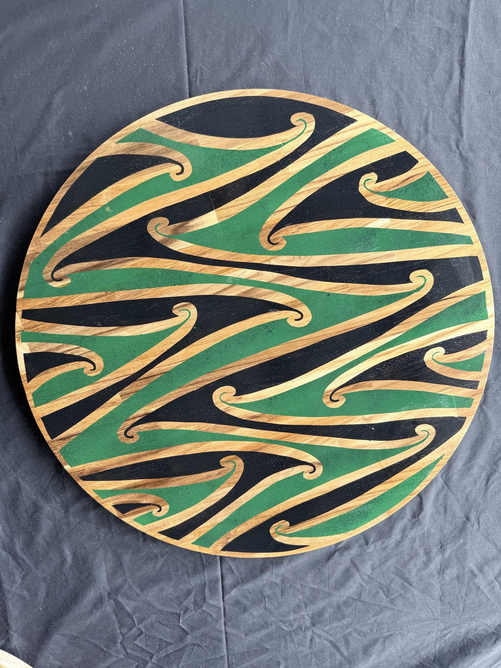 Hori.Inc Kōwhaiwhai platter, green resin curls across the full board