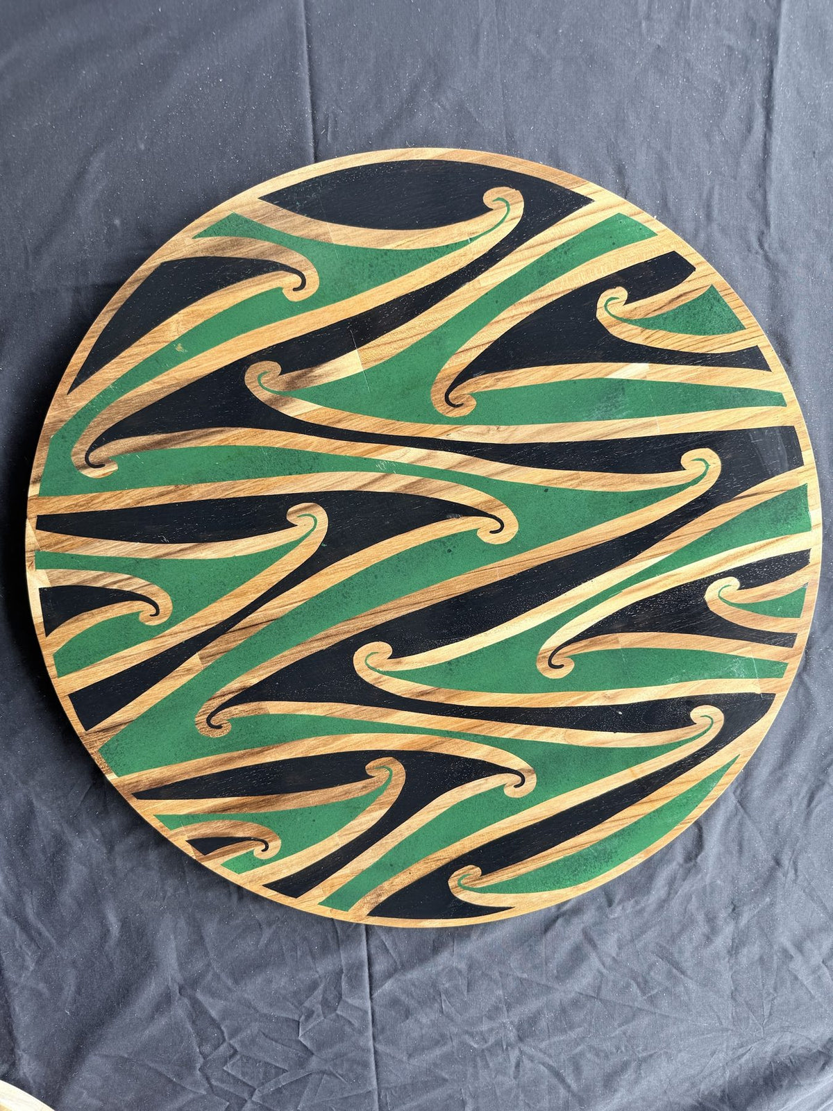 Hori.Inc Kōwhaiwhai platter, green resin curls across the full board