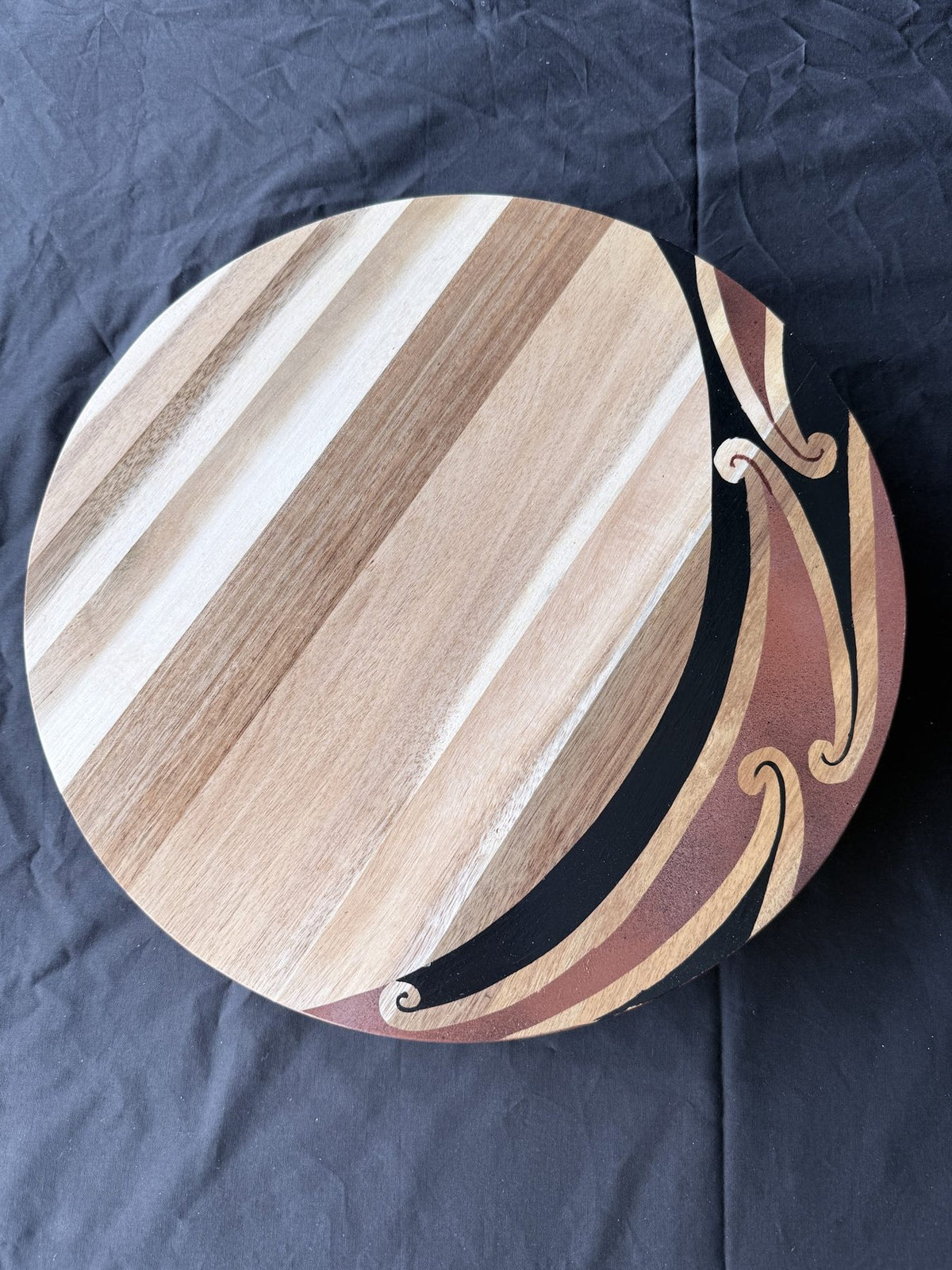 Hori.Inc small lazy Susan, brown resin kōwhaiwhai curls on the edge