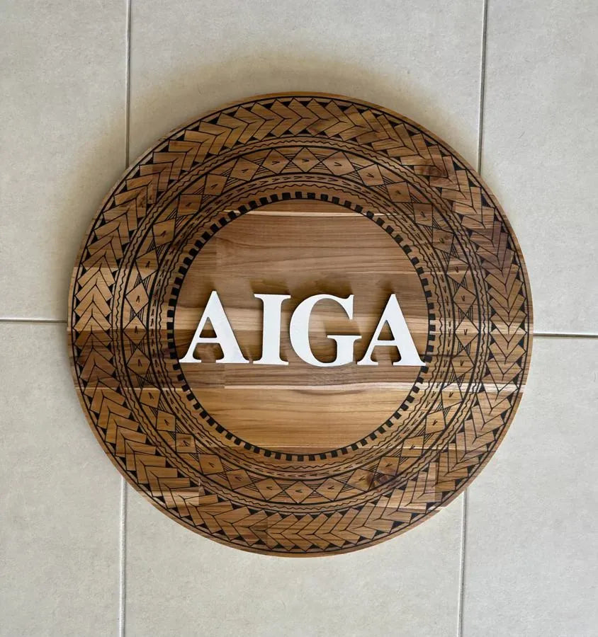 Pasifika timber name board reading AIGA