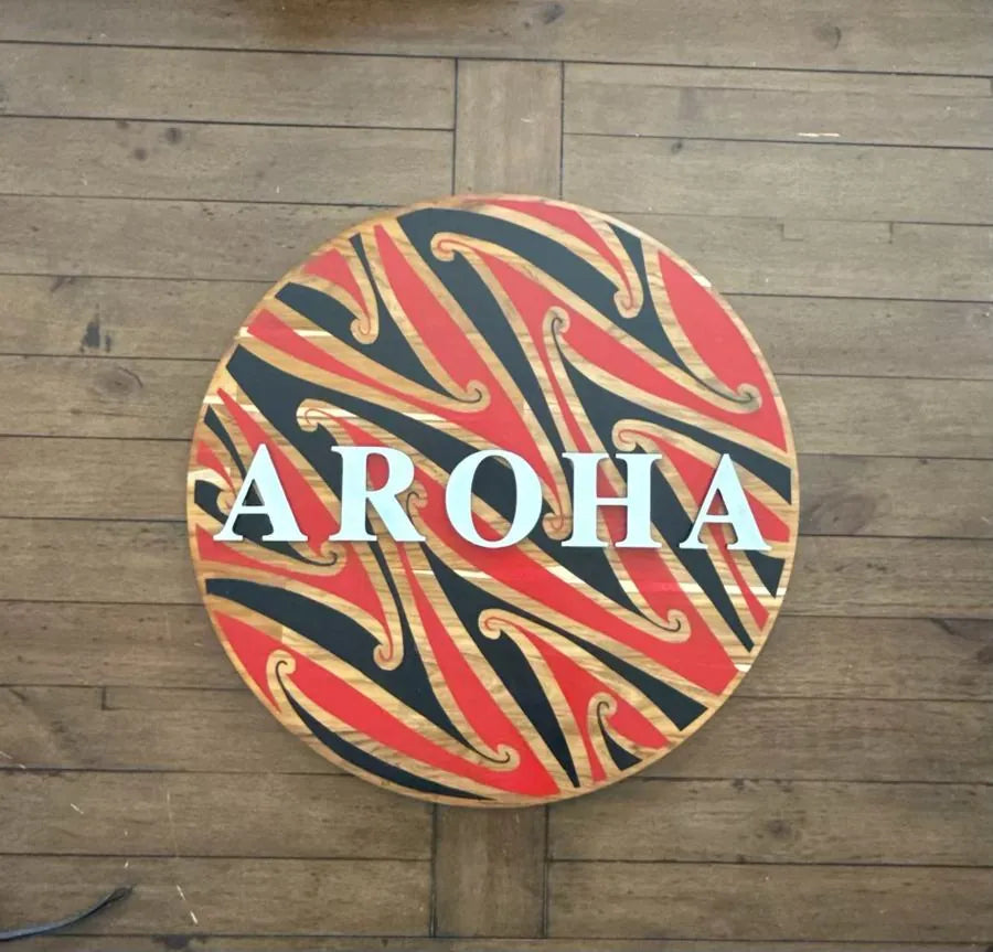 Ingoa name board reading AROHA