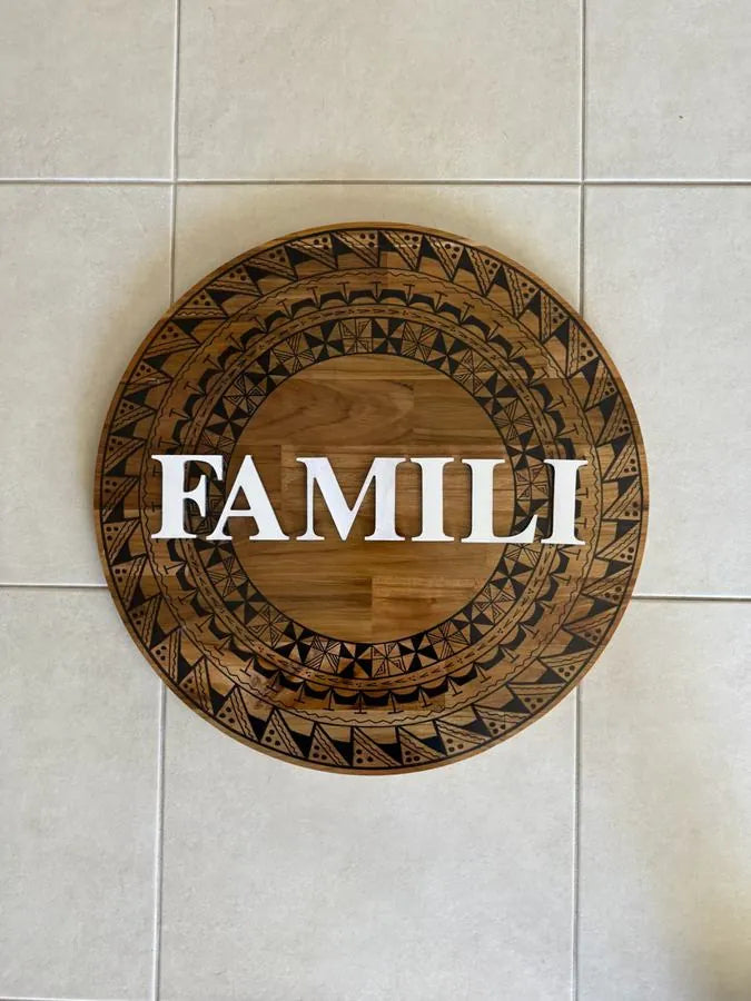 Pasifika timber name board reading FAMILI