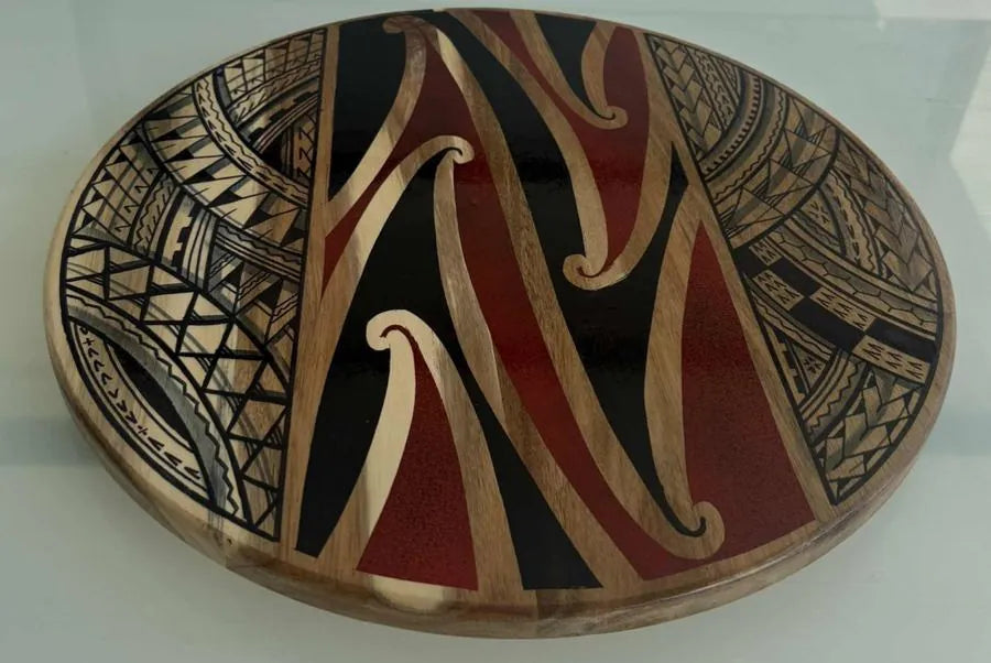 Spinning lazy Susan with resin koru design